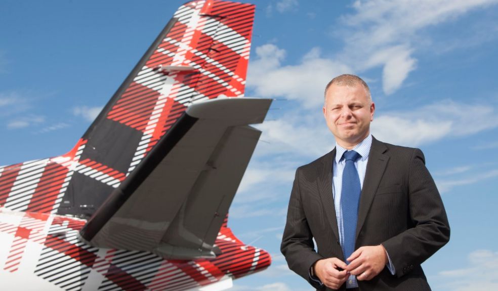 Jonathan Hinkles CEO Travel Airline Loganair launches £30,000 community renewable energy fund 