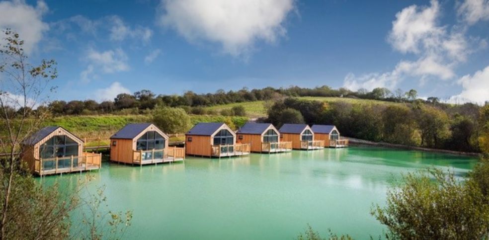 Sitting on the dock of the lake First look at luxury Devon lake holiday pods travel