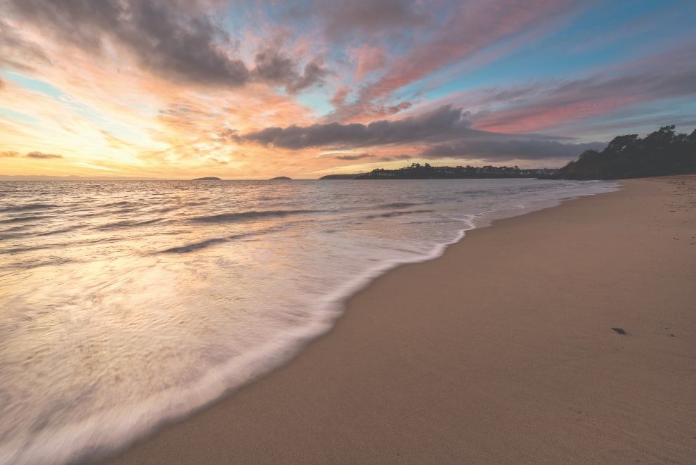 The Warren Beach Sunset - Haulfryn Holidays staycation travel